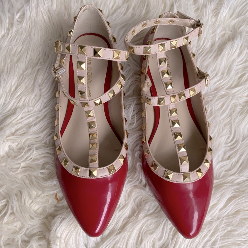 Gorgeous red flats with studs.